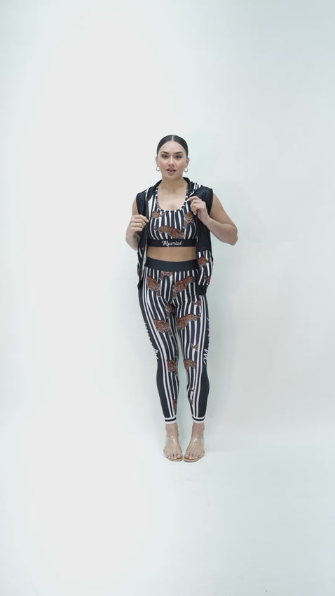 Model is 5'7 150lbs wearing size small leggings and medium tops