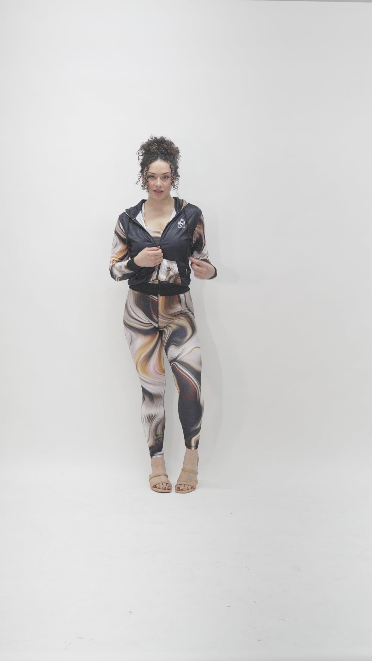 Model is 5'7 150lbs wearing size small leggings and medium tops