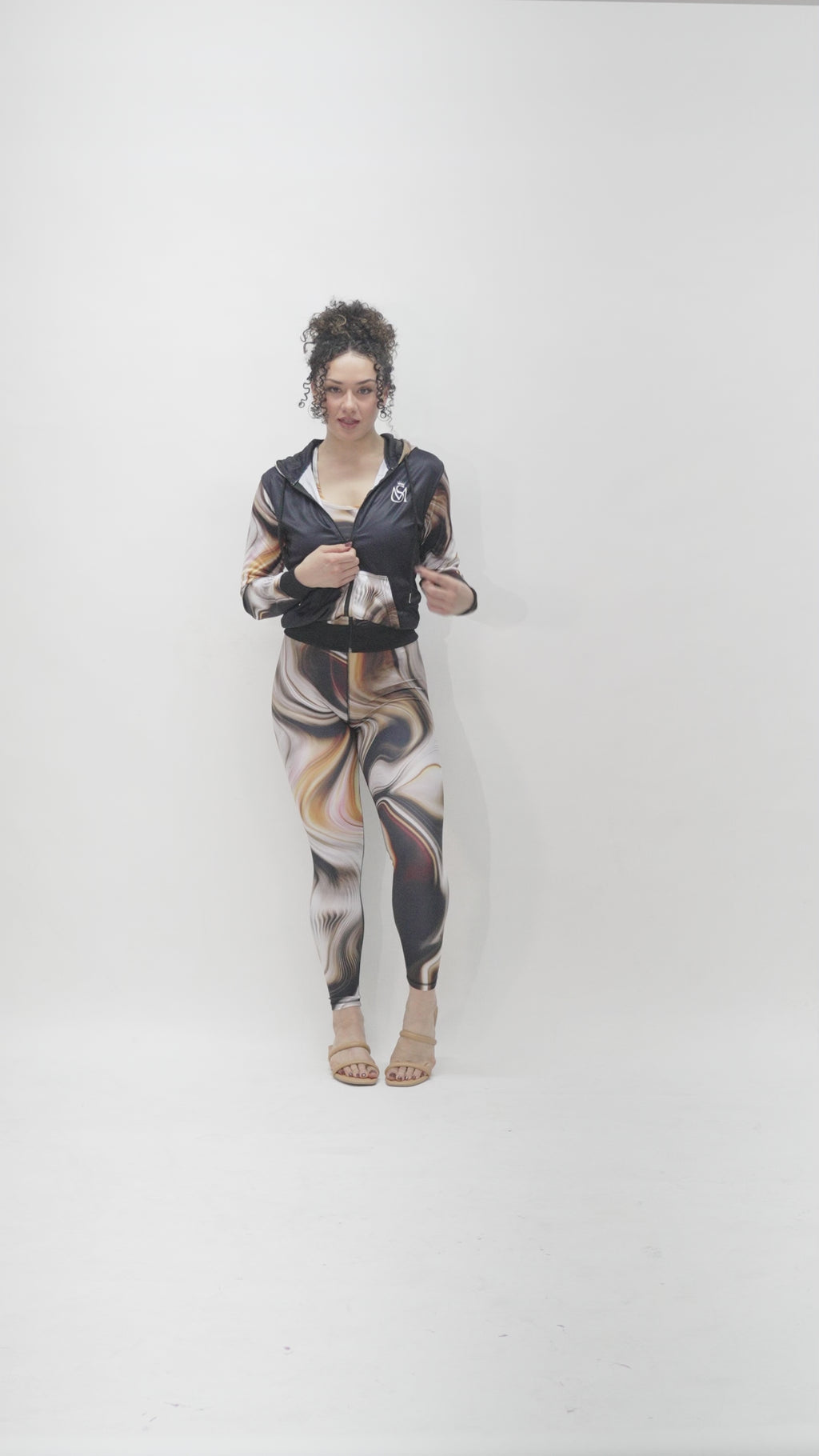 Model is 5'7 150lbs wearing size small leggings and medium tops