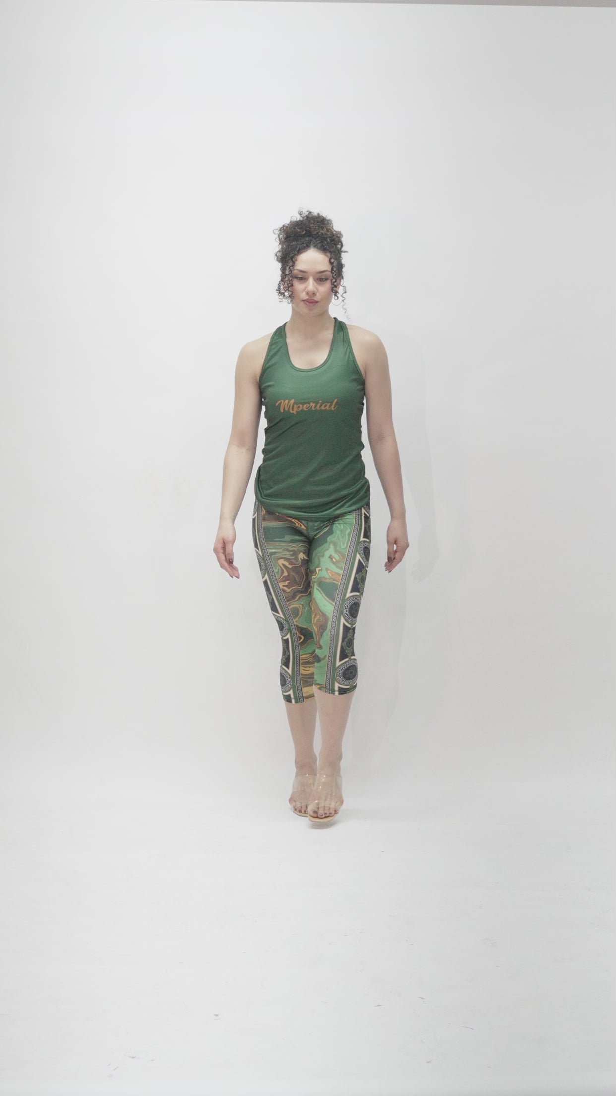 Model is 5'7 150lbs wearing size small leggings and medium tops 